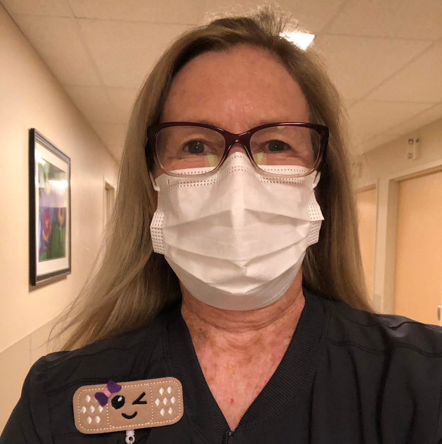 Lisa Dahms, a registered nurse fighting cancer herself, continues to support patients amid the COVID-19 pandemic.