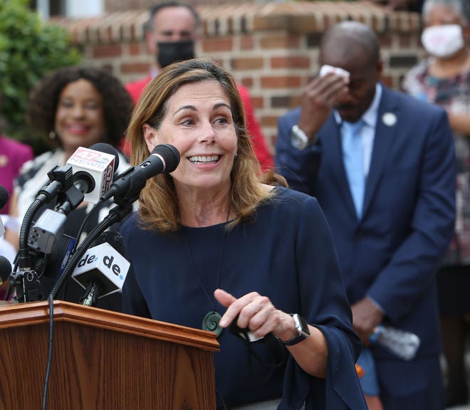 Delaware Attorney General Kathy Jennings speaks at a news conference in June about the need to pass laws to combat police brutality and racial injustice in Delaware.