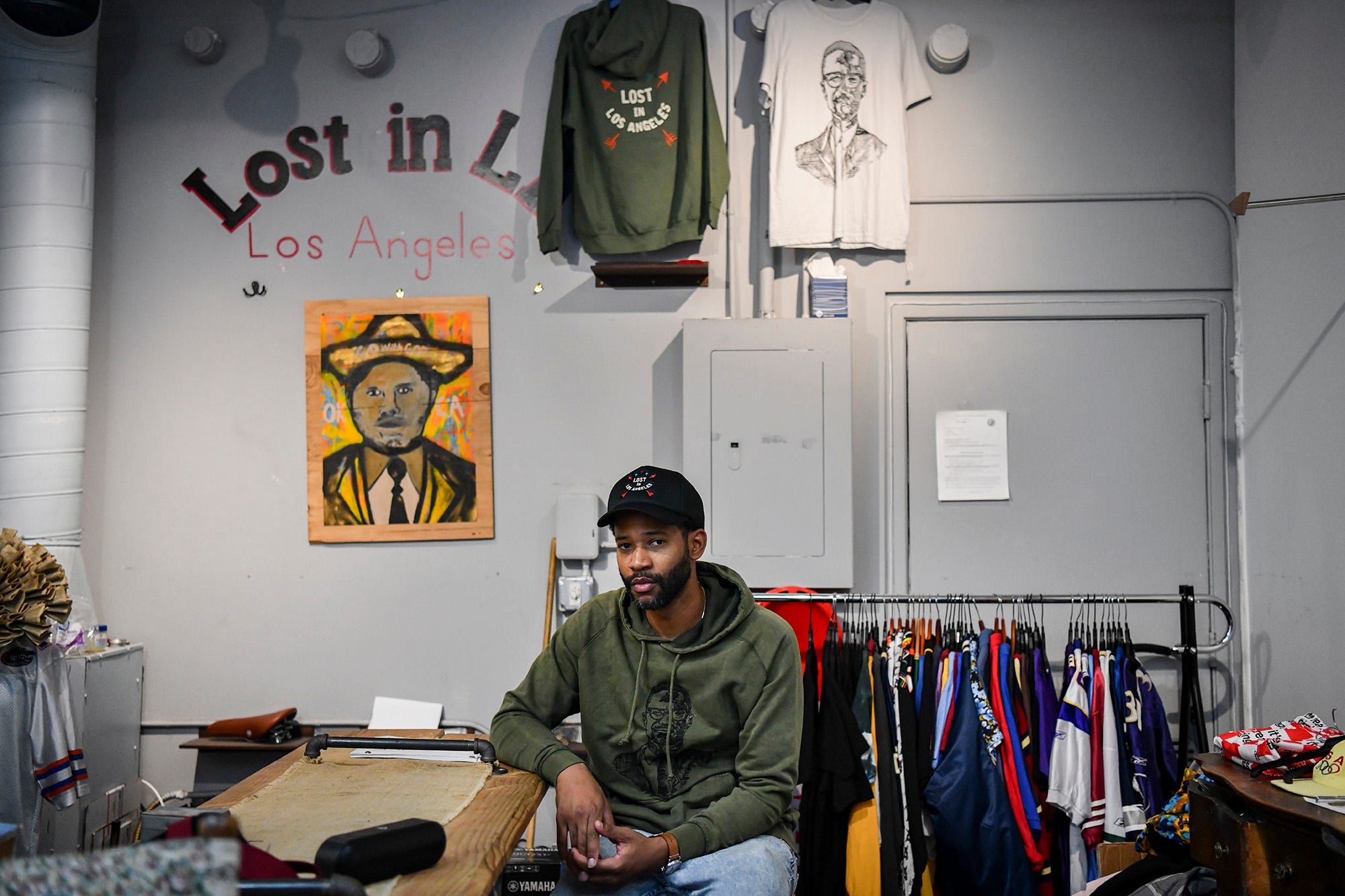 Joel Stallworth poses for a portrait in his store, The Small Shop LA, in Downtown Los Angeles, Calif. Stallworth's store was one of the dozens of stores across Los Angeles that were looted.