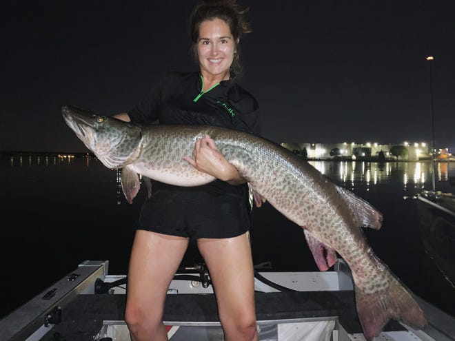 Emily Schneider of Appleton caught this 56.5-inch musky June 5 in the Fox River near De Pere.