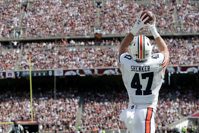 Auburn tight end John Samuel Shenker (47) catches a pass in the end zone for a touchdown against Texas A&M on Saturday, Sept. 21, 2019, in College Station, Texas.