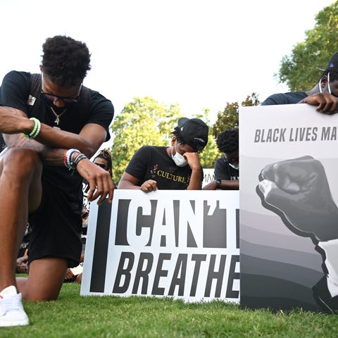 Clemson athletes lead a peaceful on-campus demonst