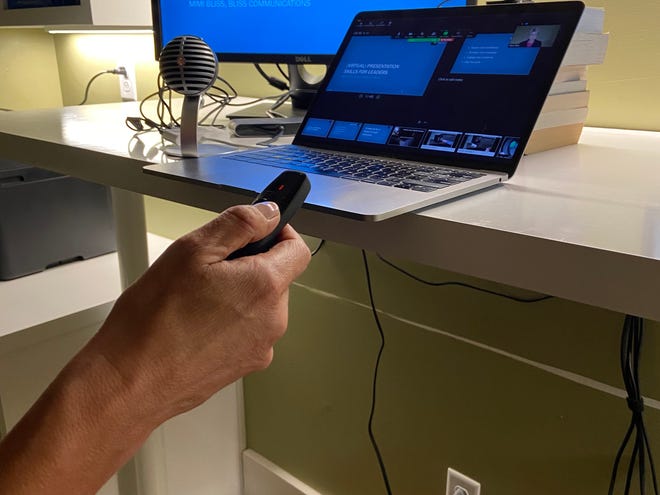 Mimi Bliss suggests using the clicker to advance slides instead of touching the computer