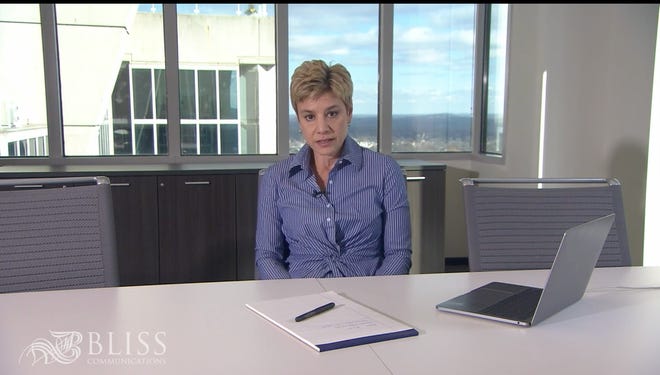 Communications expert Mimi Bliss says to use your hands in a meeting. Don't slouch