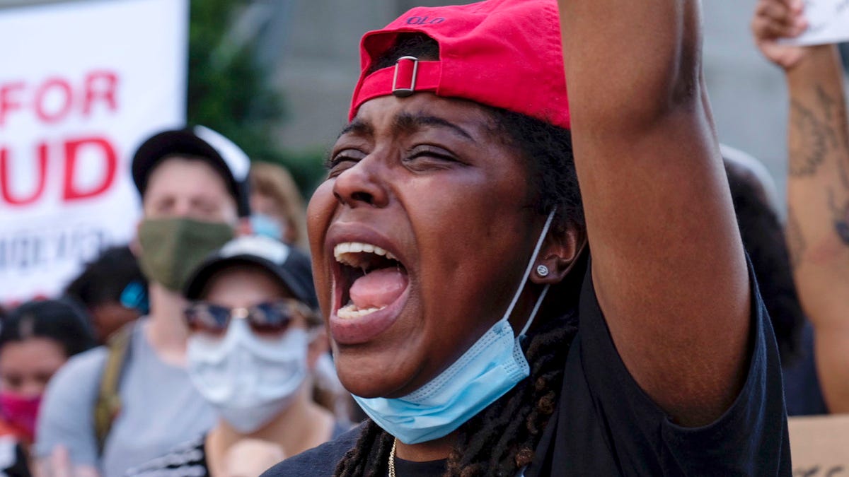 Protesters gather near Centennial Olympic Park in the evening, Saturday, June 13, 2020, in Atlanta. Rayshard Brooks, 27, a black man, was fatally shot by Atlanta police late Friday during a struggle in a Wendy's restaurant parking lot. (Ben Gray/Atlanta Journal-Constitution via AP) ORG XMIT: GAATJ702