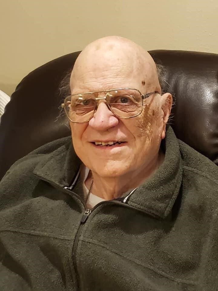 Bob Eatock in his recliner at Ramsey Village Care Center in Des Moines.
