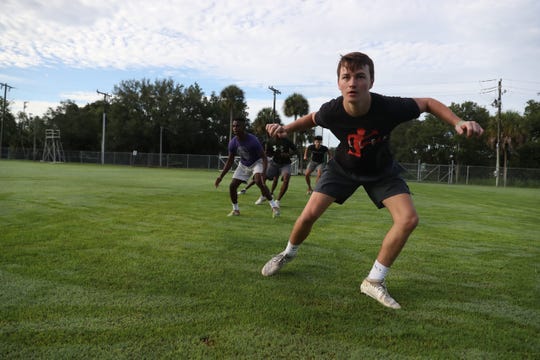 Members of the Fort Myers High School football team workout on Monday June, 15, 2020. It was the first day of summer workouts for public schools after being off because of the COVID-19 pandemic. Some private schools started workouts at the beginning of June. 