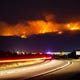 Traffic on SR-87 leads to the Bush Fire burning northeast of Phoenix in the Tonto National Forest on June 14, 2020.