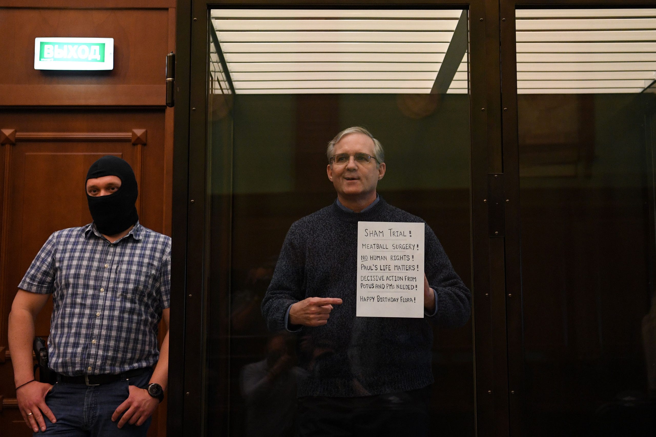 Paul Whelan stands inside a defendants' cage as he waits to hear his verdict in Moscow on June 15, 2020.