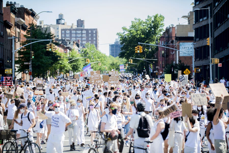 Thousands fill the streets in support of Black Trans Lives Matter and George Floyd on June 14 in the Brooklyn borough of New York City.