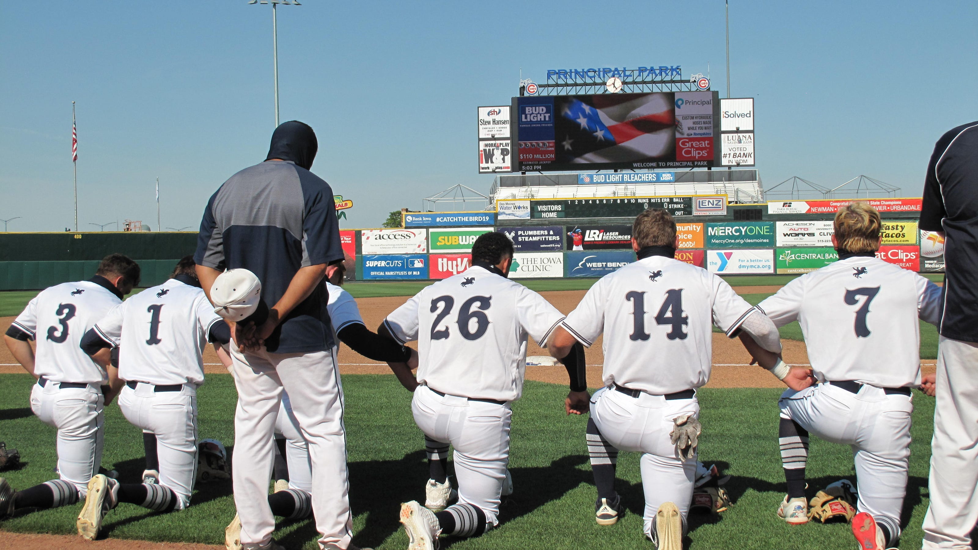 Iowa high school baseball team kneels during anthem before 2020 opener