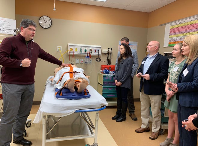 In 2018, Dr. Michael Meyer introduces members of the Dairy Cares of Wisconsin organizing committee to the simulation lab at Children’s Wisconsin, based in Milwaukee. The hands-on training in the lab allows the next generation of health care providers to safely practice for a variety of emergencies in multi-faceted educational space.
