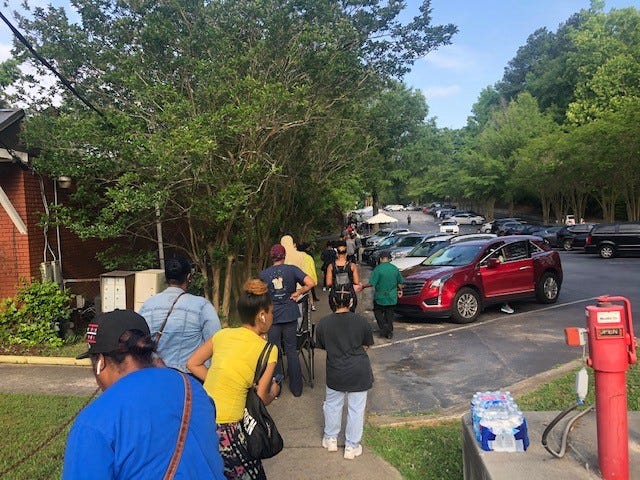 Voters wait in line at a southwest Atlanta polling place for the June 9 primary.