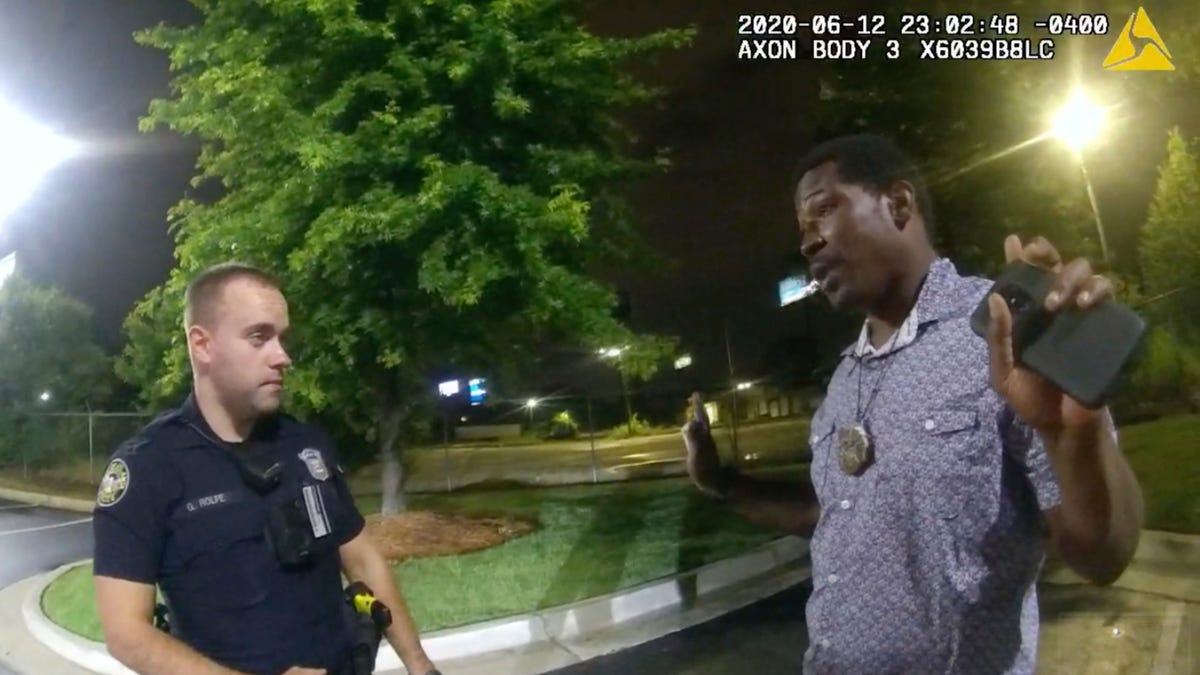 Rayshard Brooks with Atlanta police officer Garrett Rolfe on June 12, 2020.
