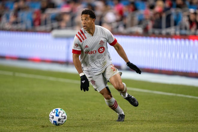 Mar 7, 2020; Toronto, Ontario, CAN; Toronto FC defender Justin Morrow (2) moves the ball against New York City FC at BMO Field.