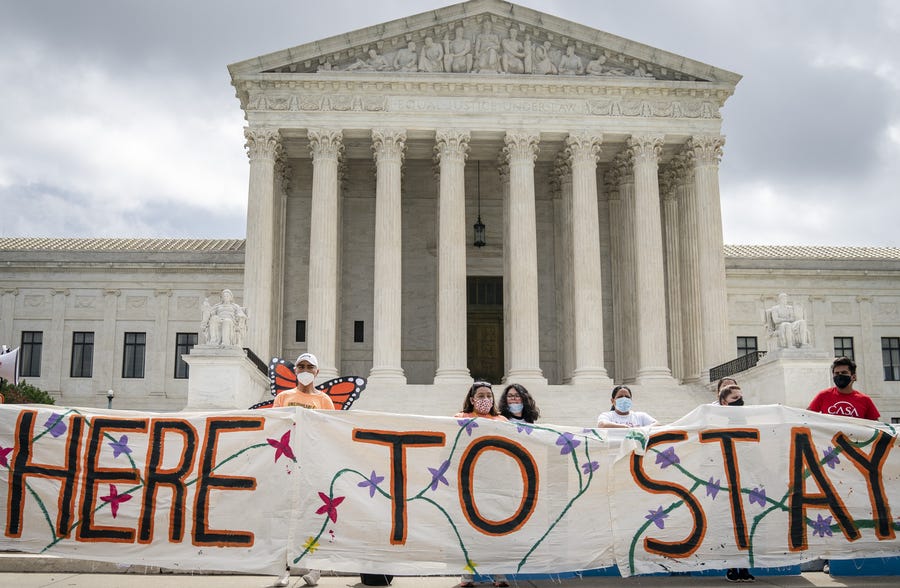 DACA recipients and their supporters rally outside the U.S. Supreme Court on June 18, 2020 in Washington, DC. On Thursday morning, the Supreme Court, in a 5-4 decision, denied the Trump administration's attempt to end DACA, the Deferred Action for Childhood Arrivals program.