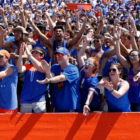 Florida Gators fans cheer in the student section a