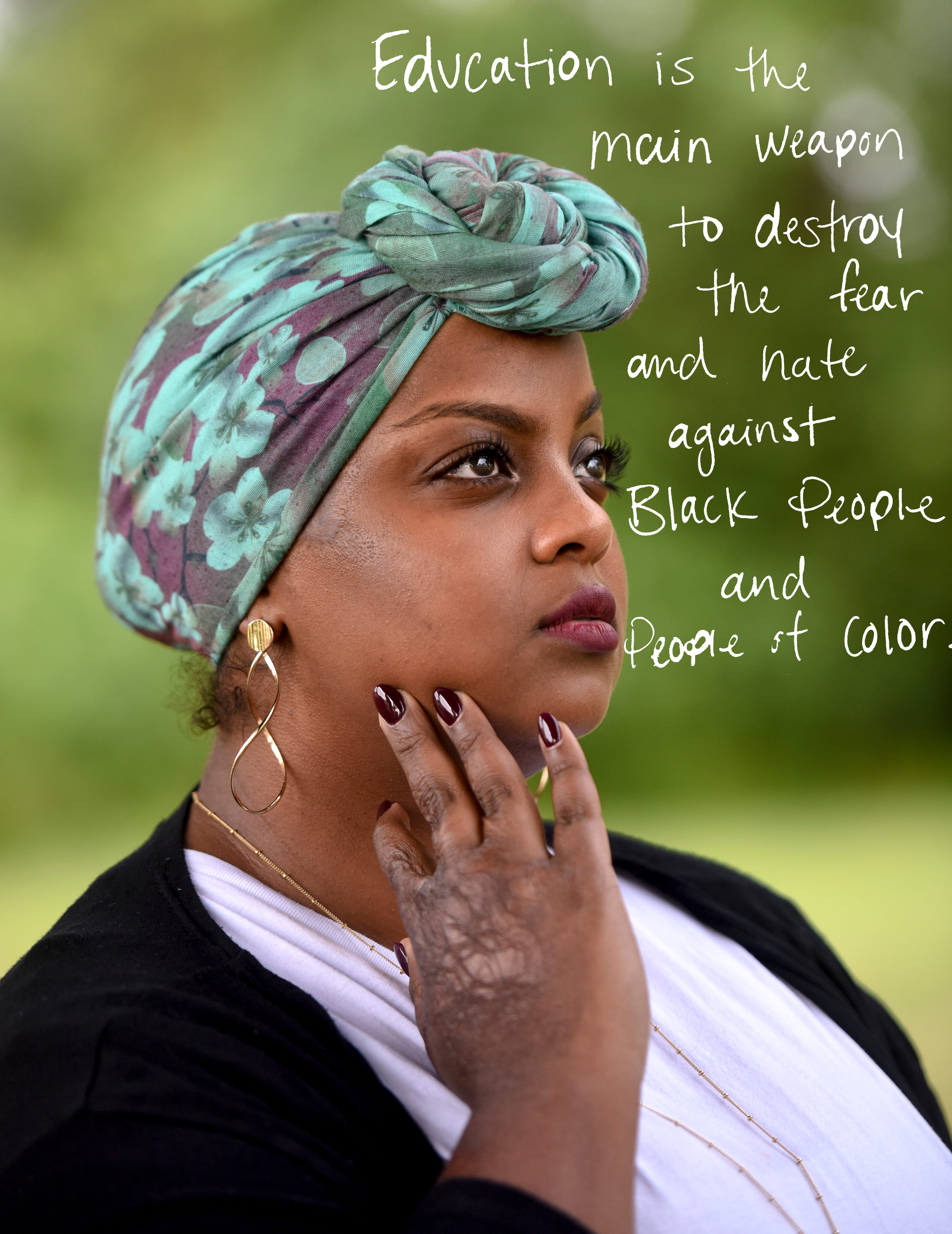 In this photo illustration, Iman Omar's reasons for protesting are seen over her portrait on Thursday, June 18, 2020 in Sioux Falls, S.D. "Education is the main weapon to destroy the fear and hate against Black people and people of color," Omar wrote.