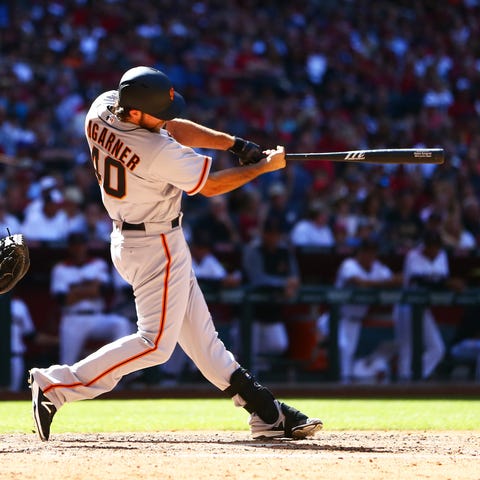 Former Giants pitcher Madison Bumgarner hits a sol