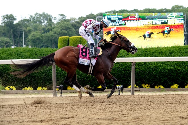June 20, 2020; Elmont, New York, USA; Manuel Franco finishes first with Tiz the Law in the152nd running of the Belmont Stakes at Belmont Park. Mandatory Credit: Michael Karas/Northjersey.com via USA TODAY NETWORK