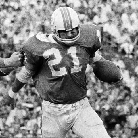 The Dolphins' Jim Kiick carried the ball during a 
