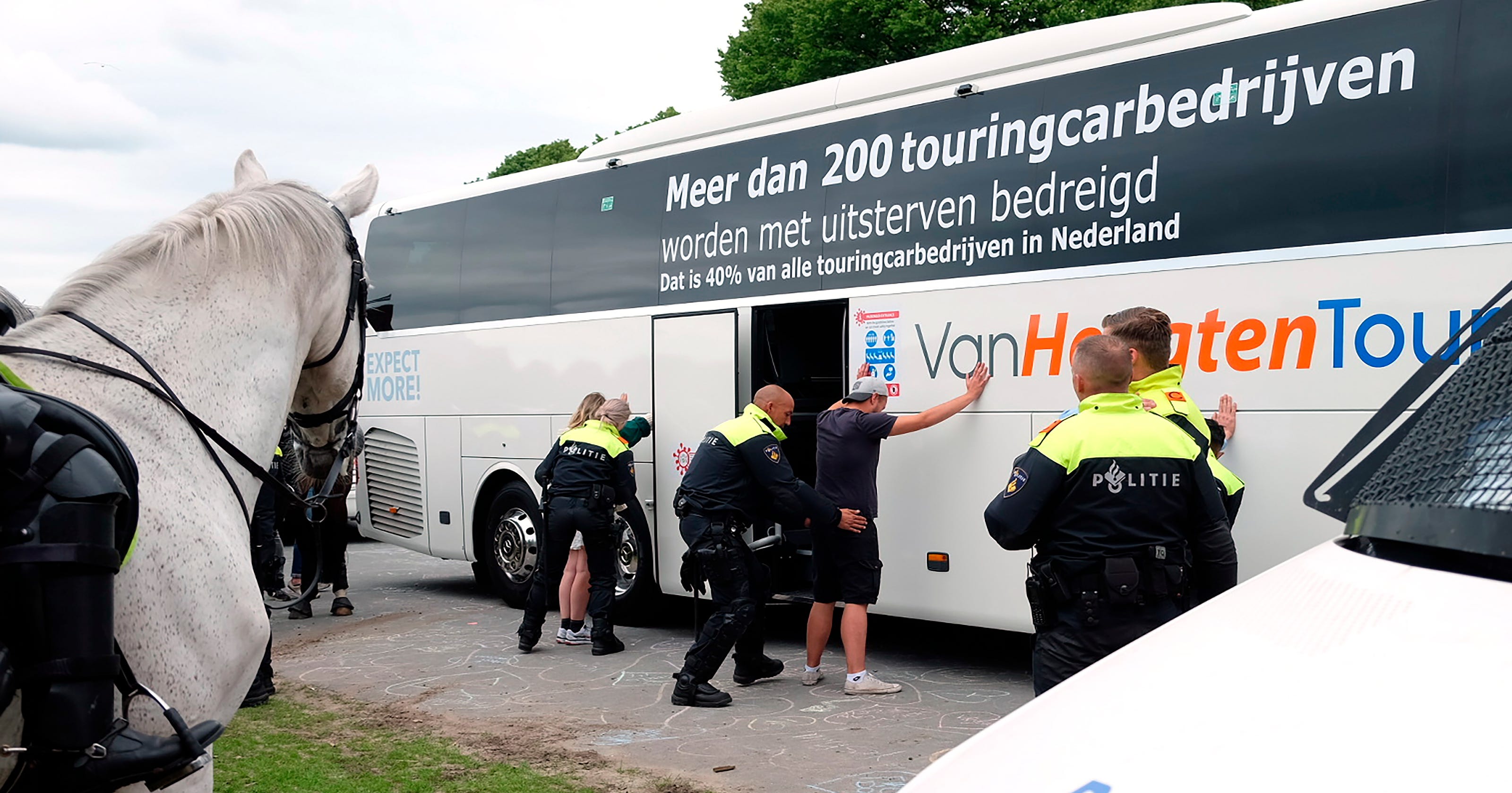 Dutch police arrest 400 after virus protest turns violent