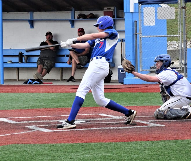 Lancaster Post 11's Nathan Hoffman rips a two-run triple against Guernsey County Thursday during the Beavers' Dame Wood Bat Tournament at Beavers Field.
