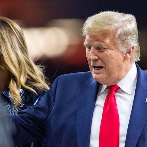 Donald and Melania Trump arrive at the Superdome f