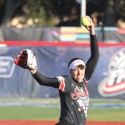 Monica Abbott gets ready to fire a pitch Monday ni