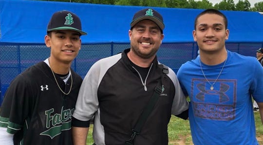 Mike Murray Jr., center, with former St. Joseph baseball stars Matt and Jon Sot.