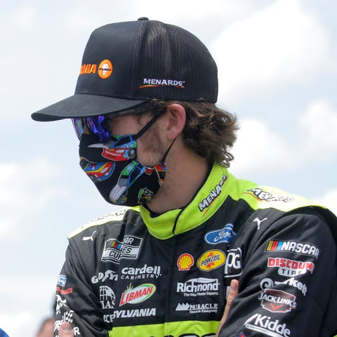 Ryan Blaney stands with close friend Bubba Wallace