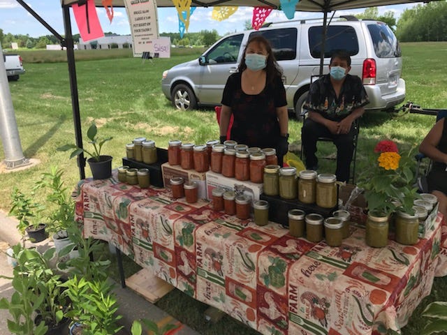 Vender Yolanda Santana of Green Bay sells homemade salsa at the Oneida Farmers' Market.