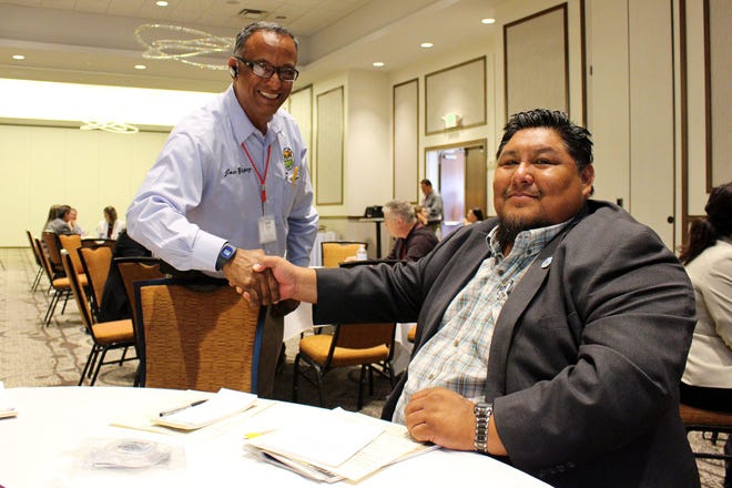 J. Deal Begay Jr. is seated at a table during an economic summit attended by members of the Cocopah Indian Tribe in this undated photo.