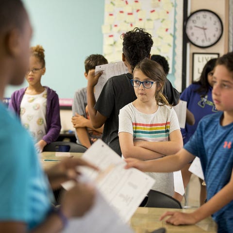 Talia Wilhelm, 10, participates in an activity whe