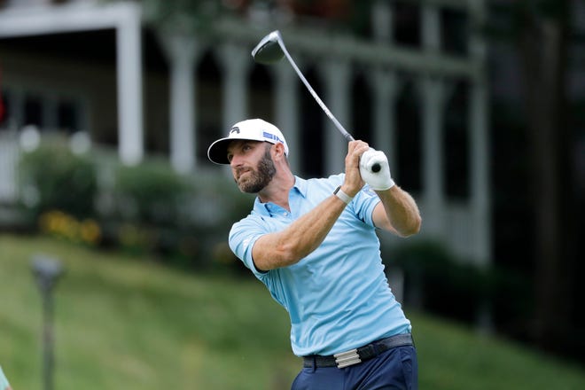 Dustin Johnson tees off on the 18th hole during the final round of the Travelers Championship golf tournament at TPC River Highlands, Sunday, June 28, 2020, in Cromwell, Conn. (AP Photo/Frank Franklin II)
