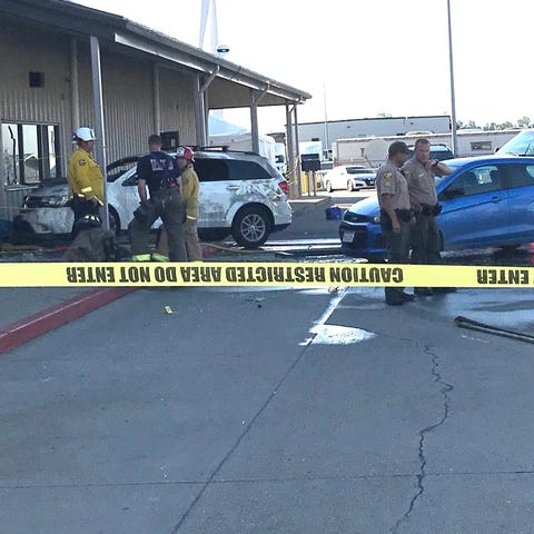 Deputies and firefighters stand outside the Red Bl
