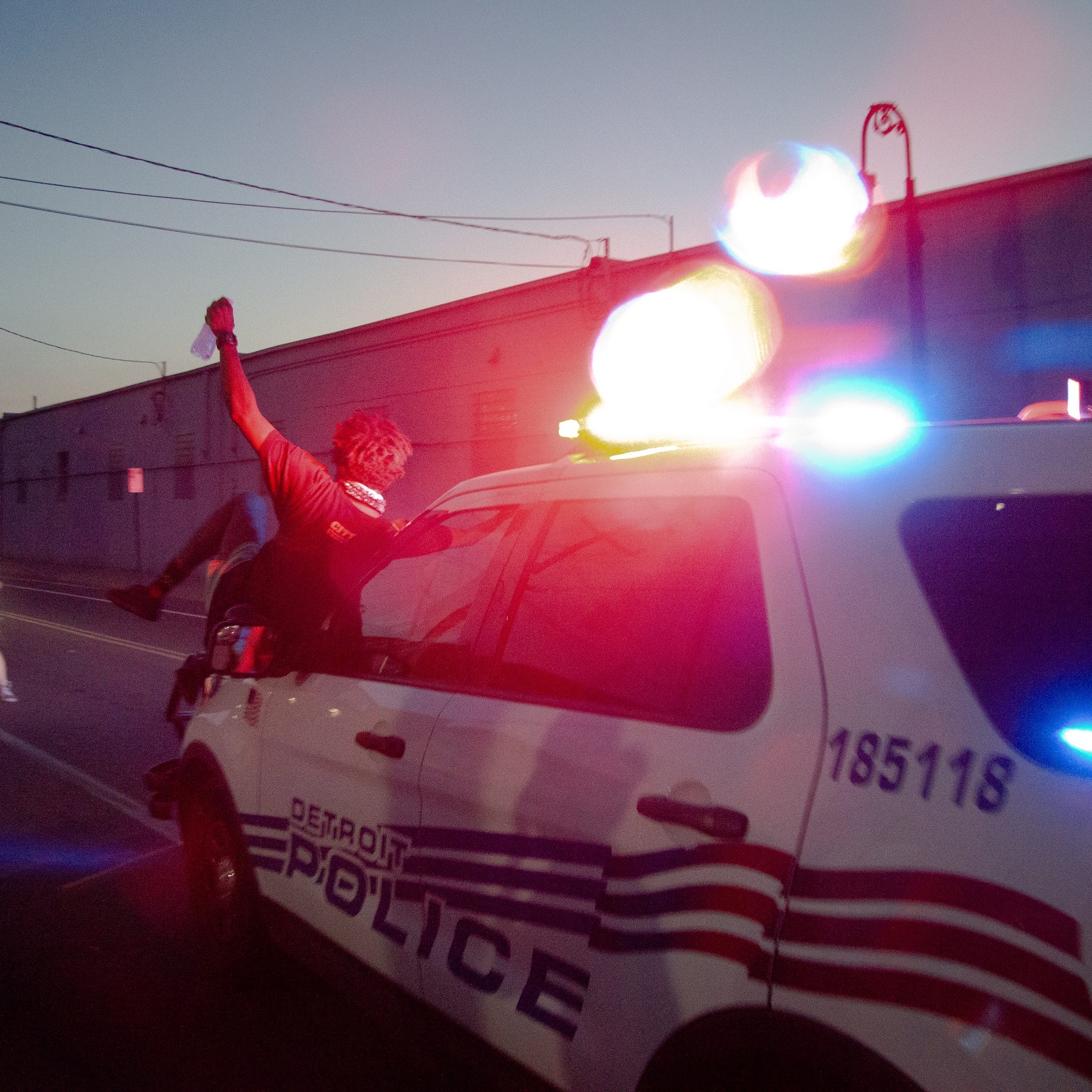 Detroit Police Suv Drives Through Crowd After Protesters Climb On Hood