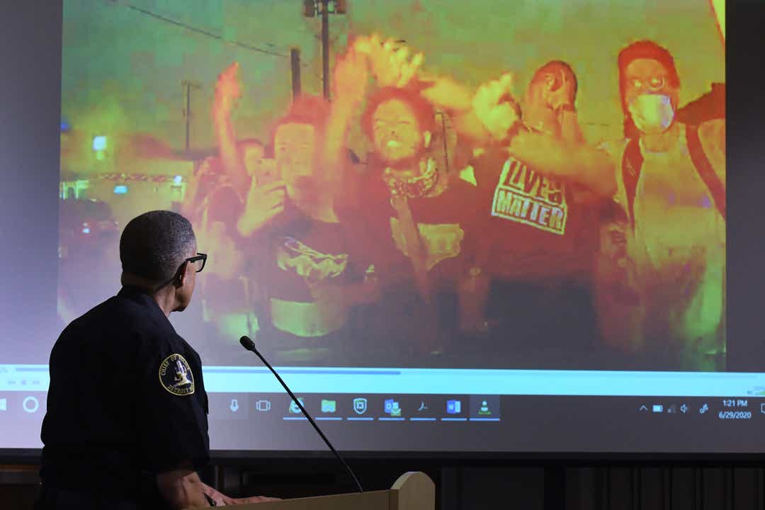 Protesters demand officer who plowed through crowd be fired - The Detroit News