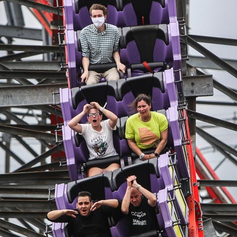 Riders on the Storm Chaser roller coaster react as