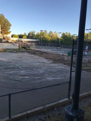 Images of the demolition of Lakeridge Tennis Club courts. Andre Agassi won his first pro tournament at Lakeridge in 1986.