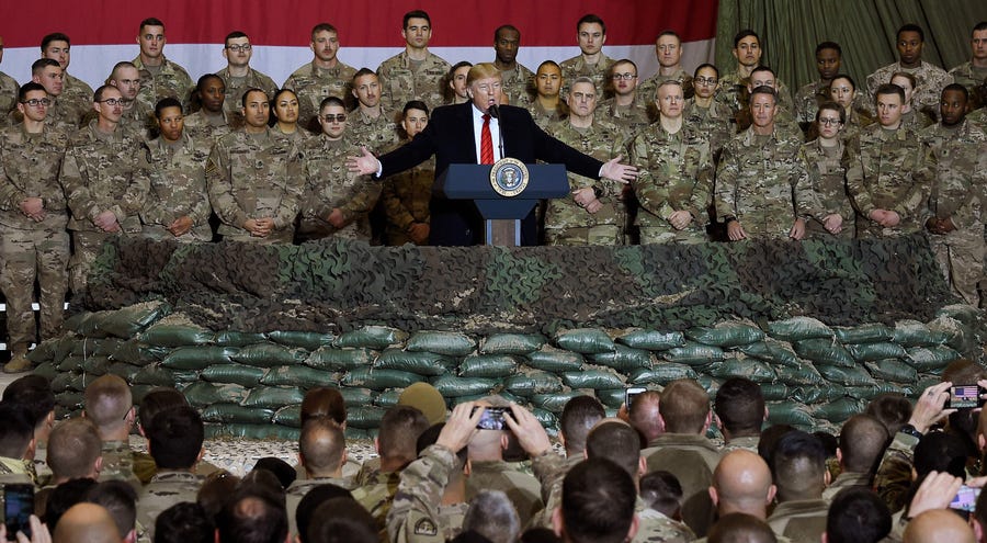 President Donald Trump speaks to the troops during a surprise Thanksgiving day visit at Bagram Air Field in Afghanistan, Nov. 28, 2019.