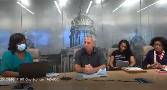 From left, Diedre DeJear, of the Financial Empowerment Center, moderates a panel with Philip Herman, Jasmine Brooks and Jackquie Easley with Lonnie Dafney on the phone during the One Economy Blueprint for Action town hall at the Des Moines Register on Tuesday, June 30, 2020