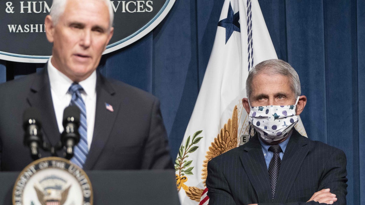 Director of the National Institute of Allergy and Infectious Diseases Anthony Fauci watches as Vice President Mike Pence speaks after leading a White House Coronavirus Task Force briefing at the Department of Health and Human Services in Washington, D.C.