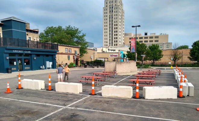 A corner of the State Street parking lot downtown will be open to outdoor dining starting Thursday.