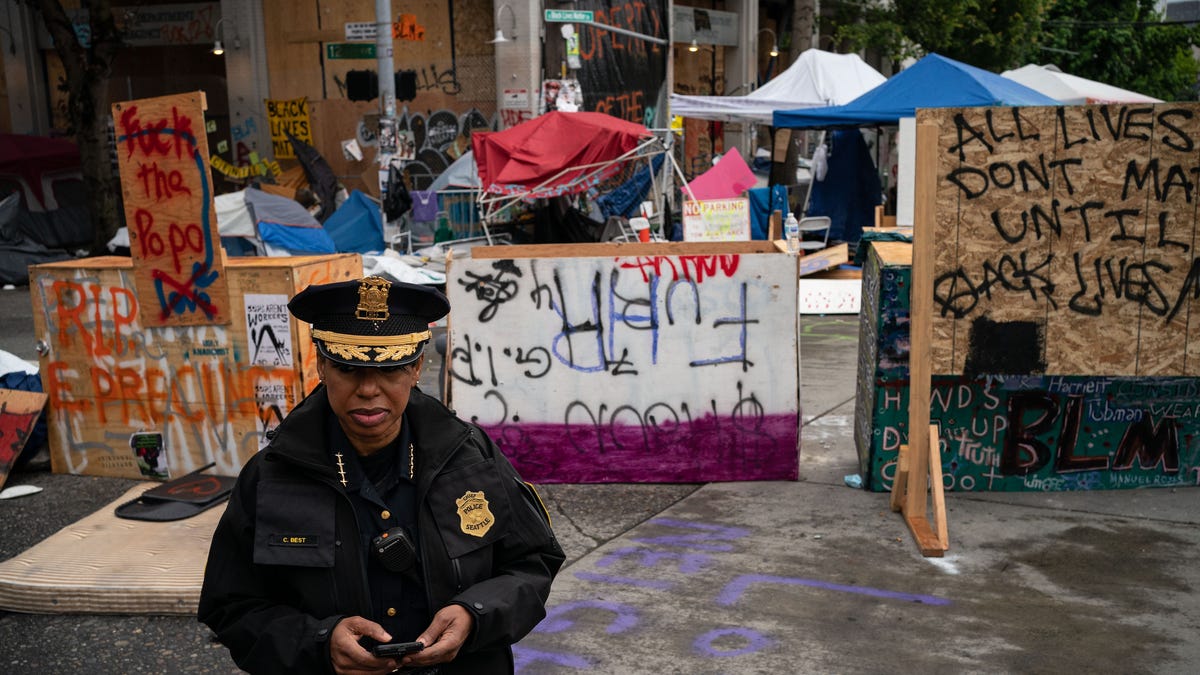 Seattle Police Chief Carmen Best stands by to address the press as city crews dismantle the Capitol Hill Organized Protest (CHOP) area outside of the Seattle Police Department's vacated East Precinct on July 1, 2020 in Seattle, Washington.