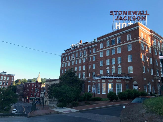 The iconic neon sign that glows bright red at night defining the Staunton skyline at the Stonewall Jackson Hotel & Conference Center in Staunton, Virginia, on Thursday, July 2, 2020.