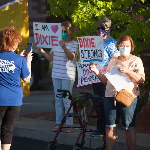 Protestors gather at the St. George City office to