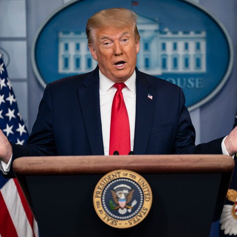 President Donald Trump speaks during a news briefi