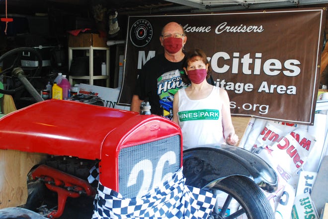 Don and Gayle Nicholson pose in face masks after Gayle fashioned a checkered-flag mask for their 1926 Model T on July 3, 2020 - although they had to cancel this summer's Cruisin' Hines car event (Source: Edward Nicholson).