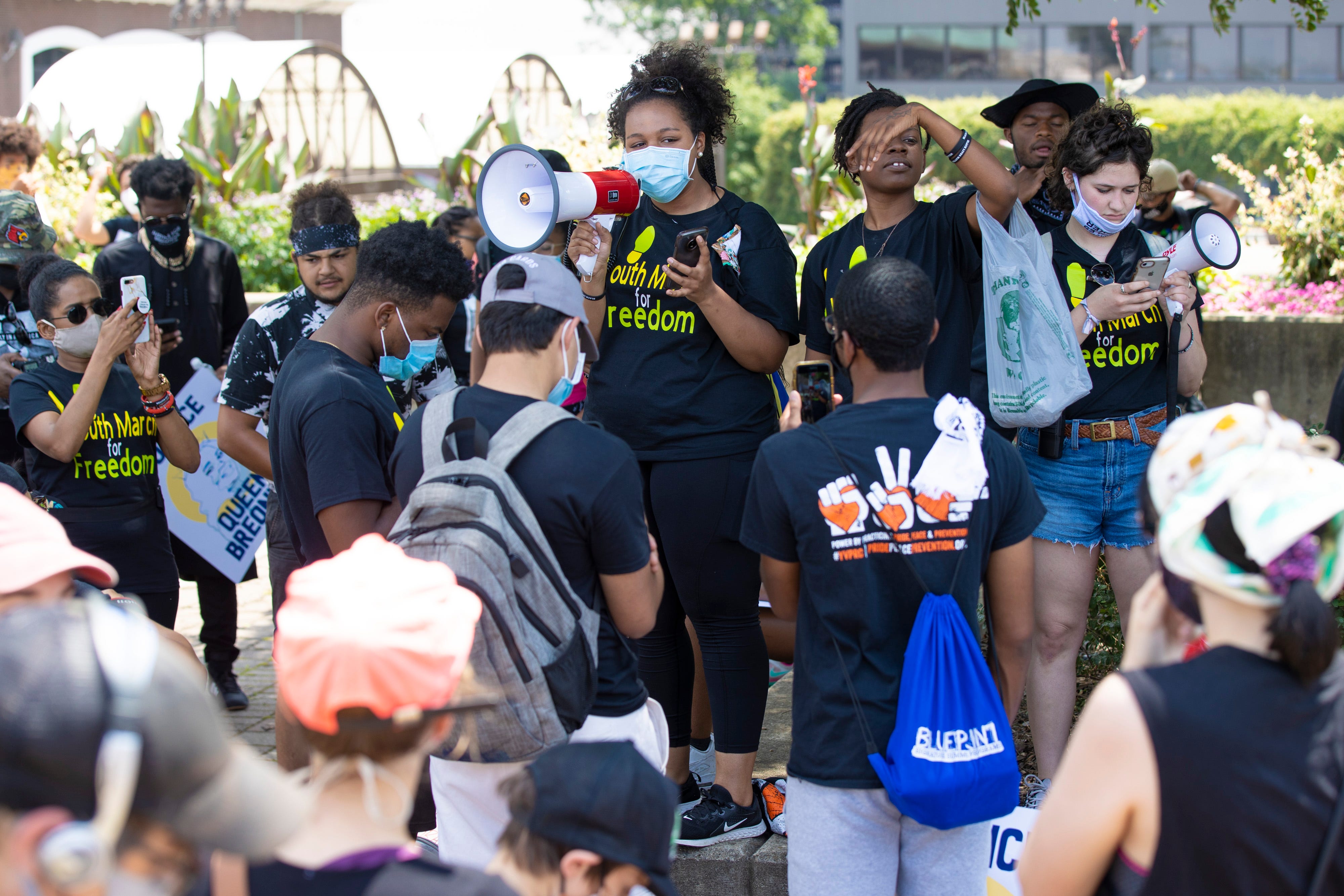 Protesters march in Louisville